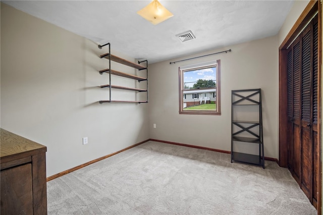 174 Hague Ln, South Union Twp, PA 15401 - unfurnished bedroom featuring light carpet, baseboards, and a closet