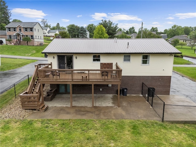 174 Hague Ln, South Union Twp, PA 15401 - back of property featuring a patio, a wooden deck, stairs, and metal roof