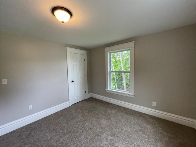 23 Columbia Park, Hempfield Twp Mer, PA 16125 - unfurnished room with dark carpet and baseboards