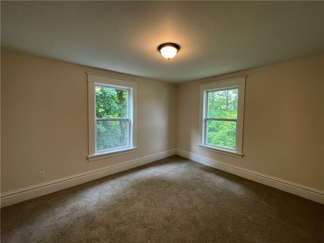 23 Columbia Park, Hempfield Twp Mer, PA 16125 - spare room featuring baseboards, healthy amount of natural light, and carpet floors