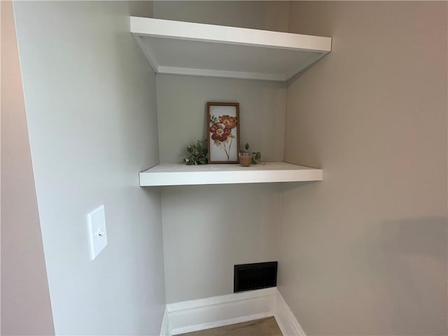 23 Columbia Park, Hempfield Twp Mer, PA 16125 - laundry room featuring baseboards