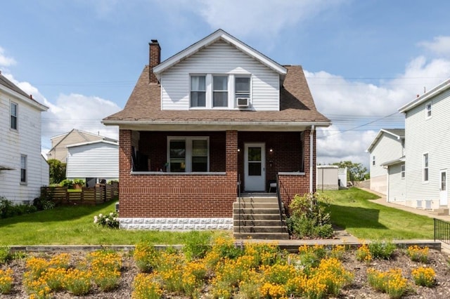 2373 E Beckert Ave, Reserve, PA 15212 - bungalow-style home with covered porch, brick siding, a chimney, and cooling unit