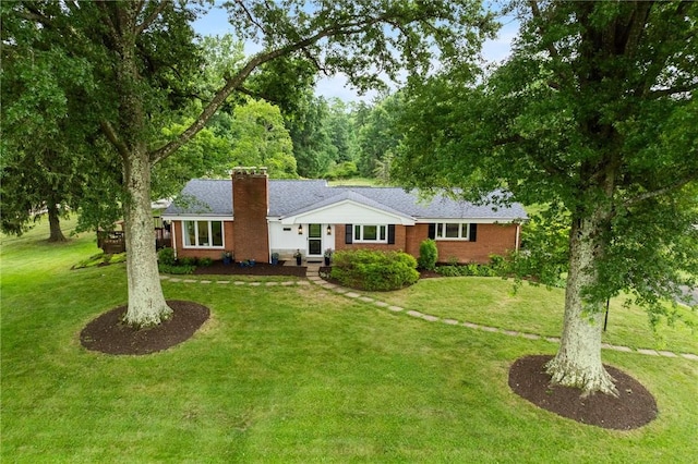1527 W Ingomar Rd, Franklin Park, PA 15237 - ranch-style house with a chimney, a front lawn, and brick siding