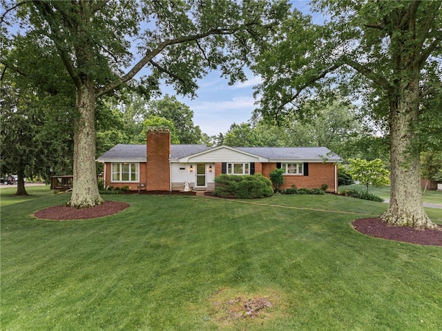 1527 W Ingomar Rd, Franklin Park, PA 15237 - ranch-style home with a chimney, brick siding, and a front lawn