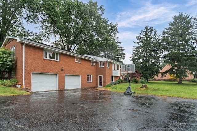 1527 W Ingomar Rd, Franklin Park, PA 15237 - view of side of property with driveway, a garage, brick siding, and a lawn