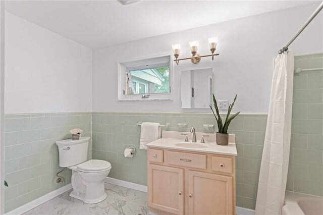 1527 W Ingomar Rd, Franklin Park, PA 15237 - bathroom with toilet, tile walls, vanity, marble finish flooring, and a wainscoted wall