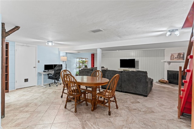 1527 W Ingomar Rd, Franklin Park, PA 15237 - dining room with an office area, a fireplace, and a textured ceiling