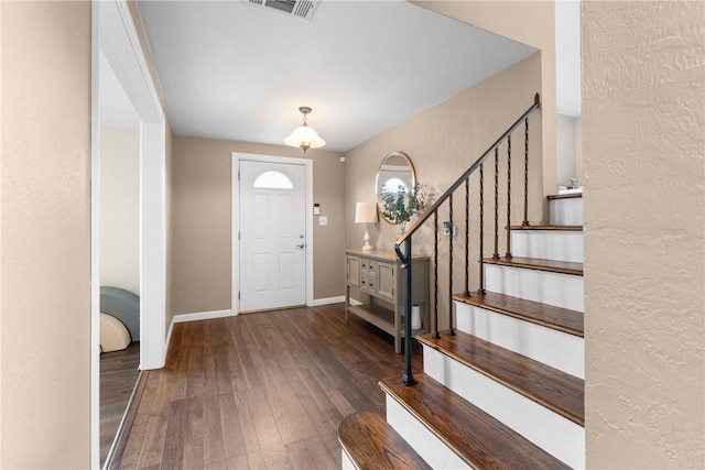 6032 Dalmation Dr, Bethel Park, PA 15102 - entryway with wood-type flooring, stairs, and baseboards