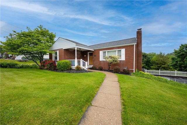 127 Burns Ave, Chippewa Twp, PA 15010 - view of front of home with a chimney and brick siding