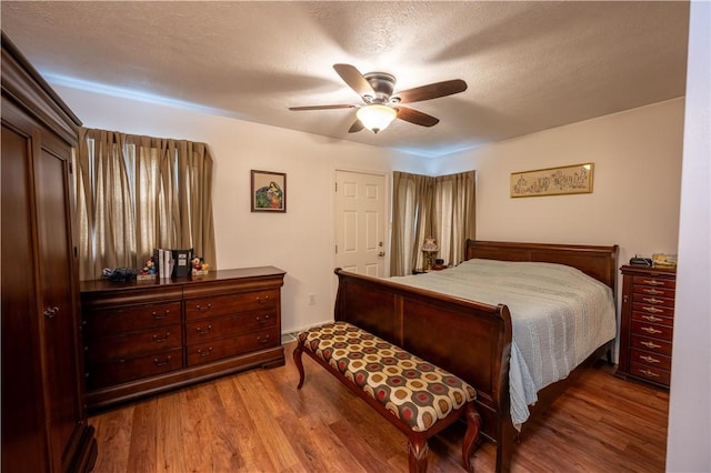 127 Burns Ave, Chippewa Twp, PA 15010 - bedroom featuring wood finished floors and a ceiling fan