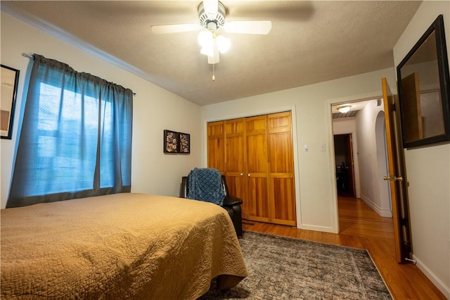 127 Burns Ave, Chippewa Twp, PA 15010 - bedroom featuring wood finished floors, a closet, baseboards, and ceiling fan