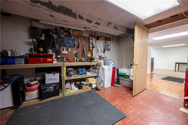 127 Burns Ave, Chippewa Twp, PA 15010 - finished basement with tile patterned floors and a workshop area