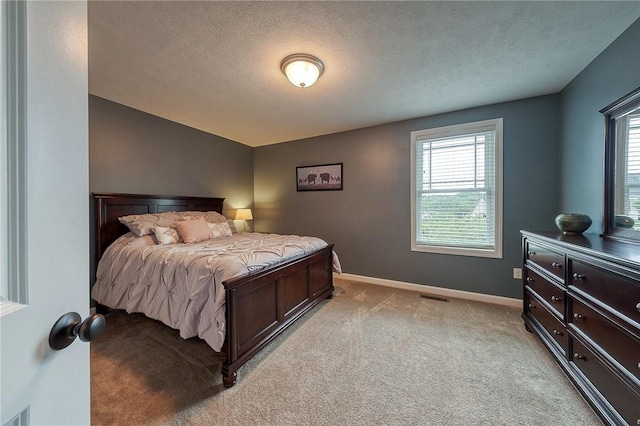 1517 Lombard Cir, South Strabane, PA 15301 - bedroom with multiple windows, light colored carpet, baseboards, and a textured ceiling