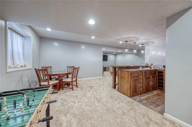 1517 Lombard Cir, South Strabane, PA 15301 - kitchen featuring a sink, light carpet, recessed lighting, baseboards, and decorative light fixtures