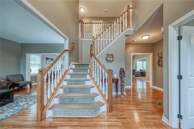 1517 Lombard Cir, South Strabane, PA 15301 - stairway featuring wood finished floors and baseboards