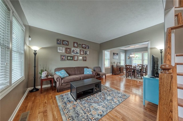1517 Lombard Cir, South Strabane, PA 15301 - living area with light wood-style flooring and baseboards