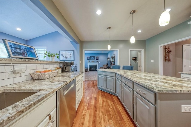 1517 Lombard Cir, South Strabane, PA 15301 - kitchen with dishwasher, gray cabinets, light wood finished floors, light stone counters, and recessed lighting