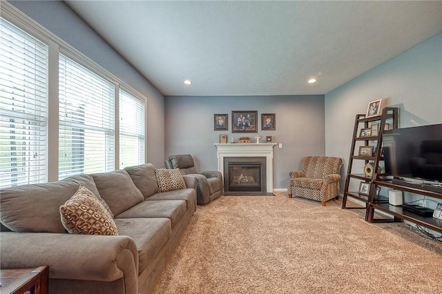 1517 Lombard Cir, South Strabane, PA 15301 - living area featuring light colored carpet, a fireplace with flush hearth, and recessed lighting