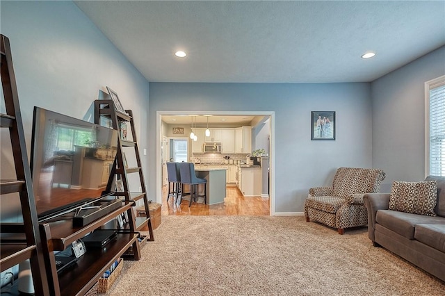 1517 Lombard Cir, South Strabane, PA 15301 - living room featuring light carpet, healthy amount of natural light, recessed lighting, and baseboards