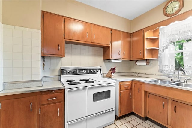 146 Samuel St, Chippewa Twp, PA 15010 - kitchen featuring white electric range, a sink, open shelves, and light countertops
