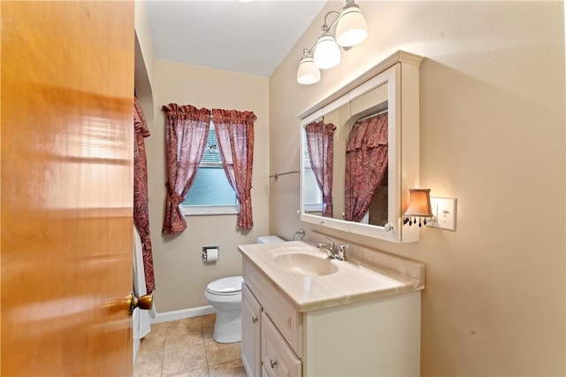 146 Samuel St, Chippewa Twp, PA 15010 - bathroom featuring vanity, toilet, baseboards, and tile patterned floors