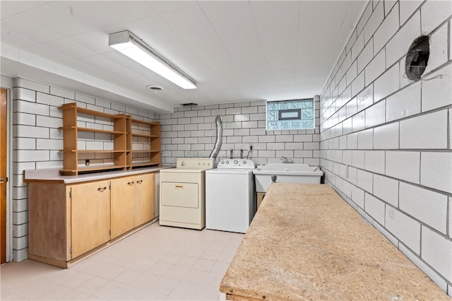 146 Samuel St, Chippewa Twp, PA 15010 - laundry area featuring separate washer and dryer and cabinet space