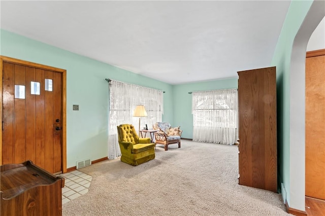 146 Samuel St, Chippewa Twp, PA 15010 - living area featuring arched walkways, baseboards, and carpet flooring