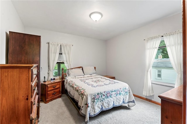 146 Samuel St, Chippewa Twp, PA 15010 - bedroom featuring light carpet, multiple windows, and baseboards