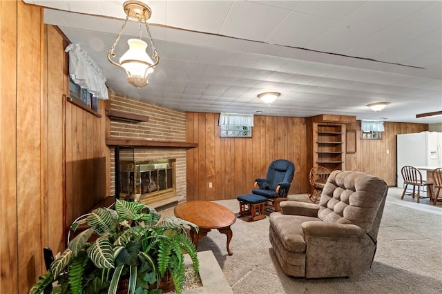 146 Samuel St, Chippewa Twp, PA 15010 - living area featuring carpet flooring, wooden walls, and a fireplace