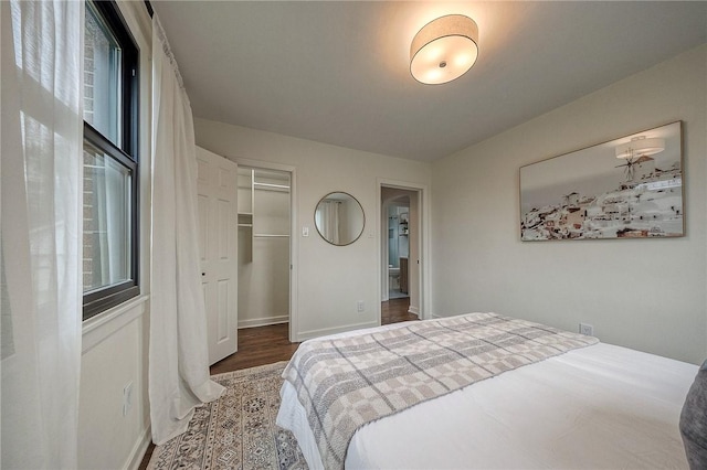 2425 W Pike St, Chartiers, PA 15342 - bedroom with wood finished floors, baseboards, a closet, and a spacious closet