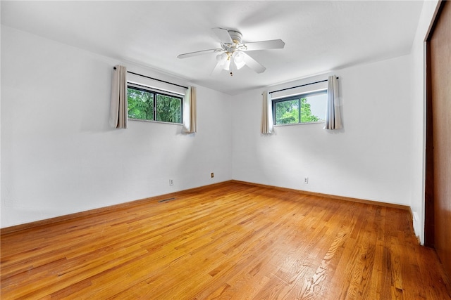 121 Edgar Ln, Peters Twp, PA 15367 - empty room with light wood-type flooring, healthy amount of natural light, a ceiling fan, and baseboards