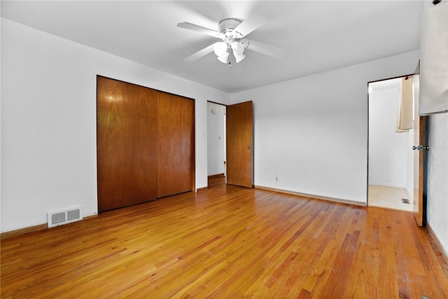121 Edgar Ln, Peters Twp, PA 15367 - unfurnished bedroom featuring light wood-type flooring, a closet, baseboards, and a ceiling fan