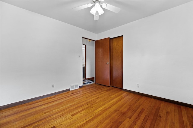 121 Edgar Ln, Peters Twp, PA 15367 - unfurnished bedroom featuring wood finished floors, baseboards, and ceiling fan