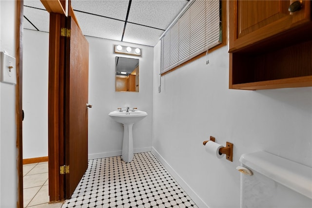 121 Edgar Ln, Peters Twp, PA 15367 - half bath with a drop ceiling, toilet, baseboards, and a sink