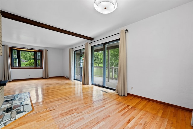 121 Edgar Ln, Peters Twp, PA 15367 - spare room with plenty of natural light, baseboards, beamed ceiling, and light wood-style flooring