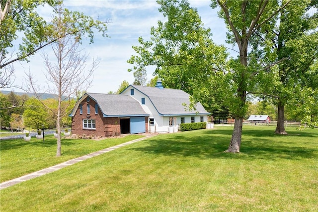 311 Derry Ridge Rd, Ligonier Twp, PA 15658 - colonial inspired home with a front yard and roof with shingles