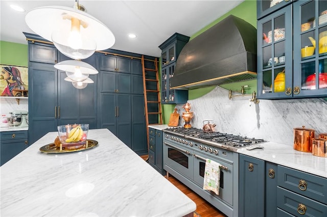 311 Derry Ridge Rd, Ligonier Twp, PA 15658 - kitchen with premium range hood, range with two ovens, backsplash, dark wood-type flooring, and recessed lighting