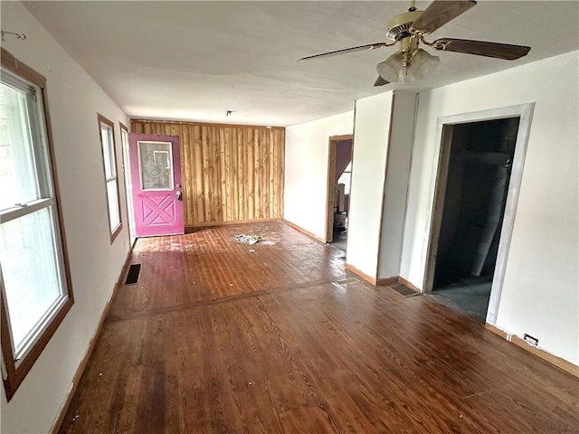 305 3rd St, Unity Twp, PA 15638 - unfurnished room featuring wood finished floors, plenty of natural light, ceiling fan, and baseboards