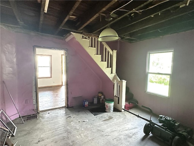 305 3rd St, Unity Twp, PA 15638 - unfurnished living room with stairway