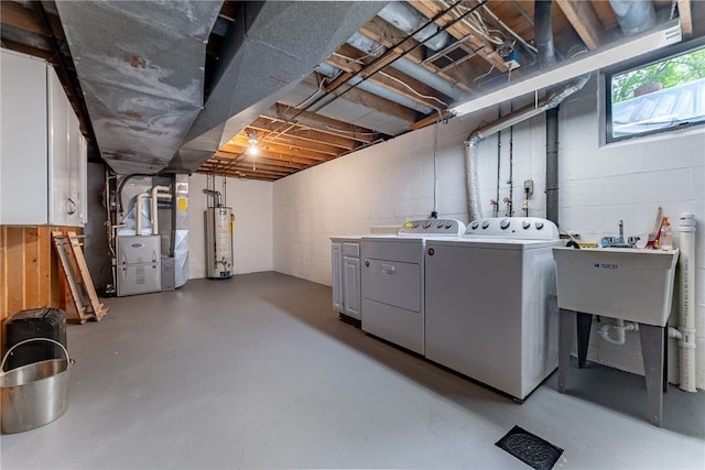 1467 Meteor Cir, Upper St Clair, PA 15241 - below grade area with washing machine and clothes dryer, water heater, heating unit, and concrete block wall