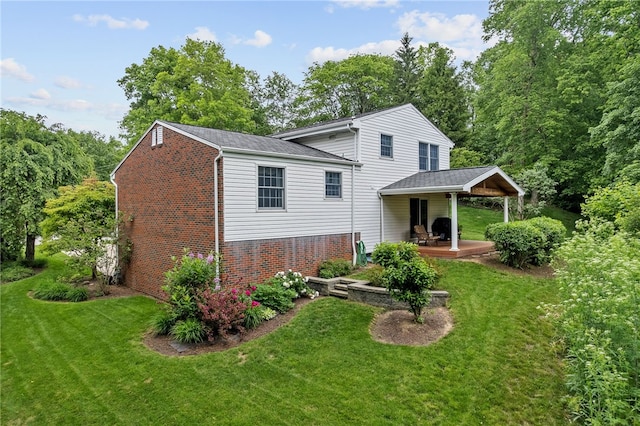 1467 Meteor Cir, Upper St Clair, PA 15241 - back of property with brick siding and a lawn