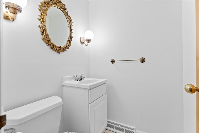 1467 Meteor Cir, Upper St Clair, PA 15241 - bathroom featuring toilet, vanity, and baseboard heating