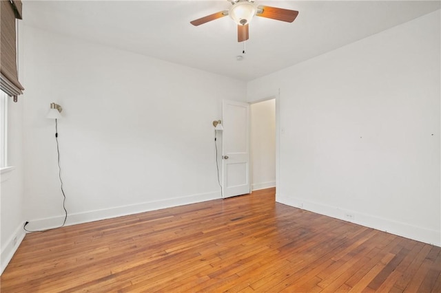 908 N Saint Clair St, Highland Park, PA 15206 - empty room with light wood-style flooring, ceiling fan, and baseboards