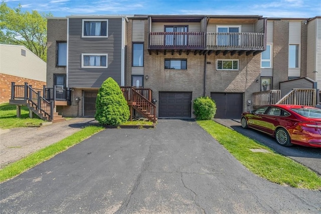 3143 Camberly Dr, Hampton, PA 15044 - multi unit property featuring stairway, a garage, driveway, and a balcony