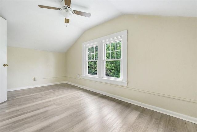 1030 N Grandview Ave, Mckeesport, PA 15132 - additional living space featuring wood finished floors, vaulted ceiling, ceiling fan, and baseboards