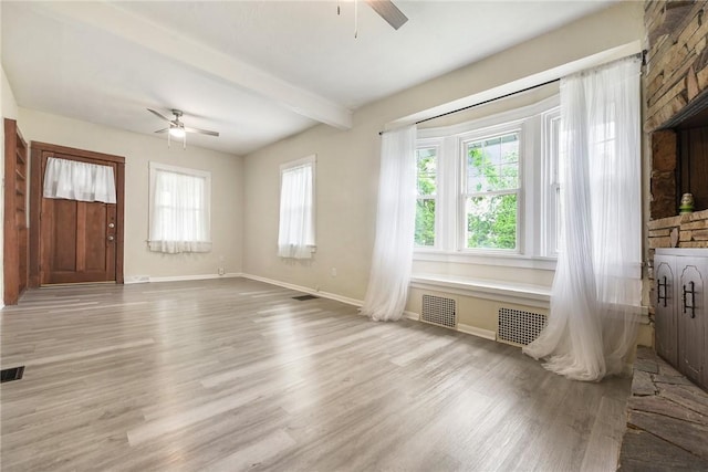 1030 N Grandview Ave, Mckeesport, PA 15132 - unfurnished living room with a ceiling fan, wood finished floors, baseboards, and beam ceiling
