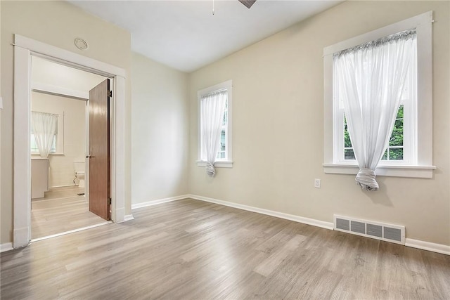 1030 N Grandview Ave, Mckeesport, PA 15132 - spare room with wood finished floors and baseboards