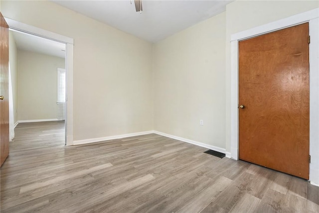 1030 N Grandview Ave, Mckeesport, PA 15132 - empty room with wood finished floors and baseboards