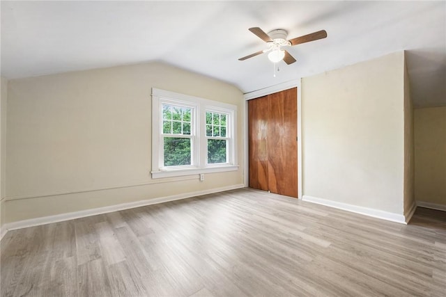 1030 N Grandview Ave, Mckeesport, PA 15132 - additional living space featuring light wood-style floors, a ceiling fan, vaulted ceiling, and baseboards