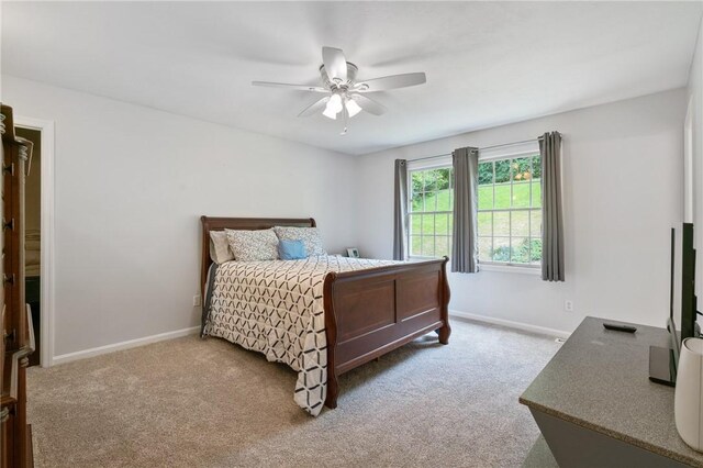 407 Pine Trees Dr, Scott Twp Sal, PA 15106 - carpeted bedroom featuring baseboards and a ceiling fan